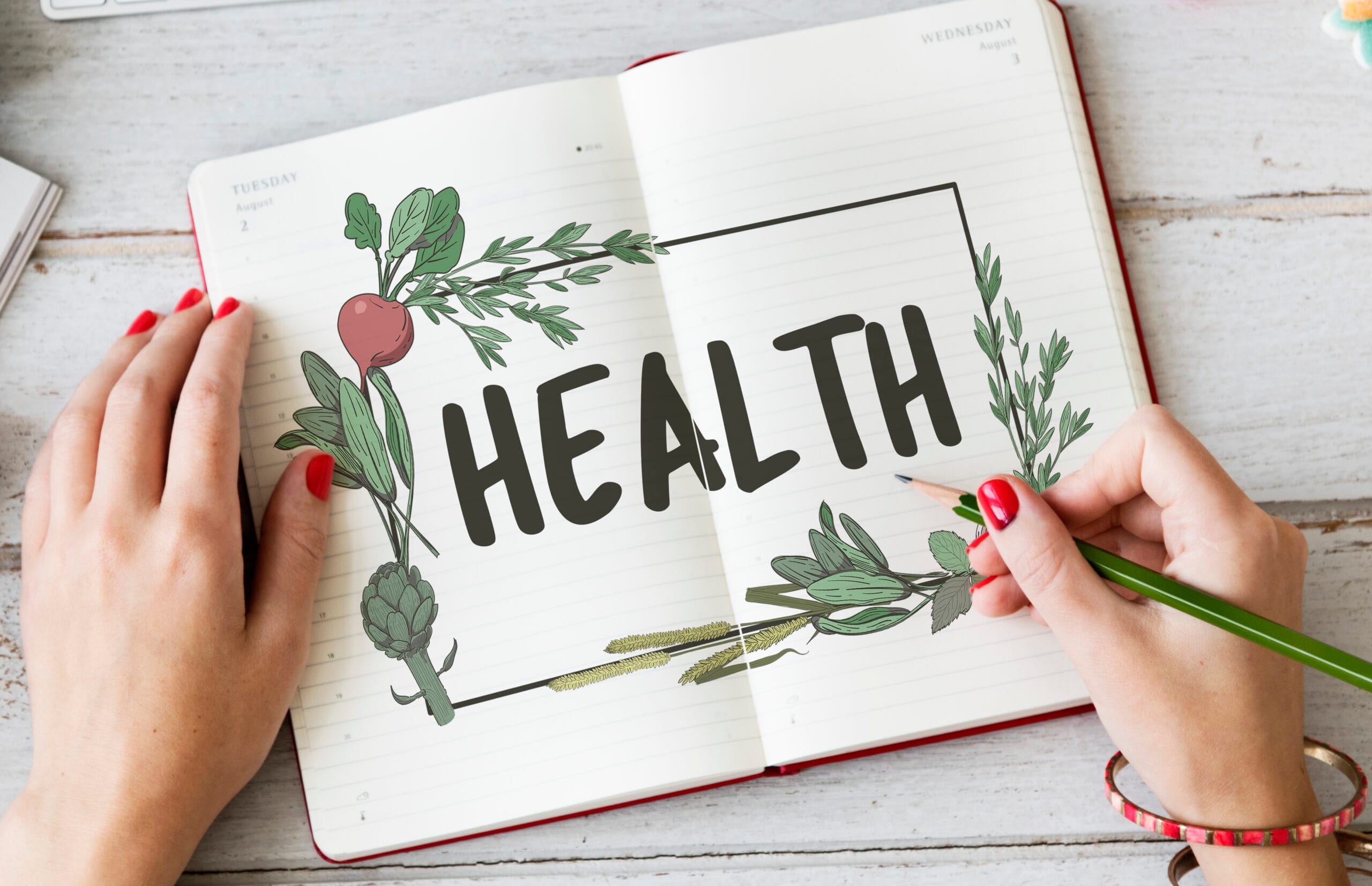 Notebook with health text and floral design